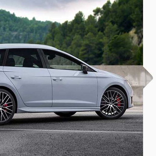 Ein weißer SEAT Leon CUPRA Kombi von 2014.