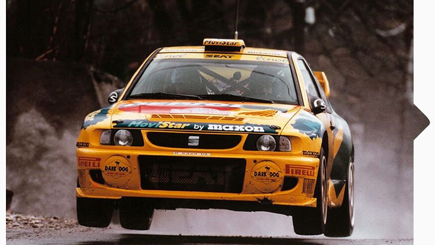 EIn gelber SEAT Cordoba WRC bei der Rallye Weltmeisterschaft 1998.
