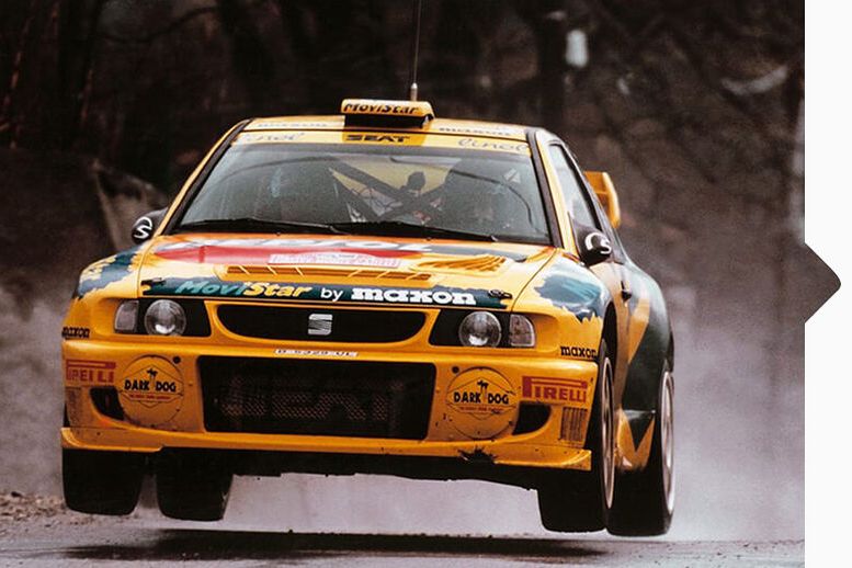 EIn gelber SEAT Cordoba WRC bei der Rallye Weltmeisterschaft 1998.