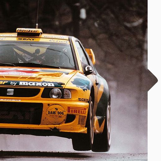EIn gelber SEAT Cordoba WRC bei der Rallye Weltmeisterschaft 1998.