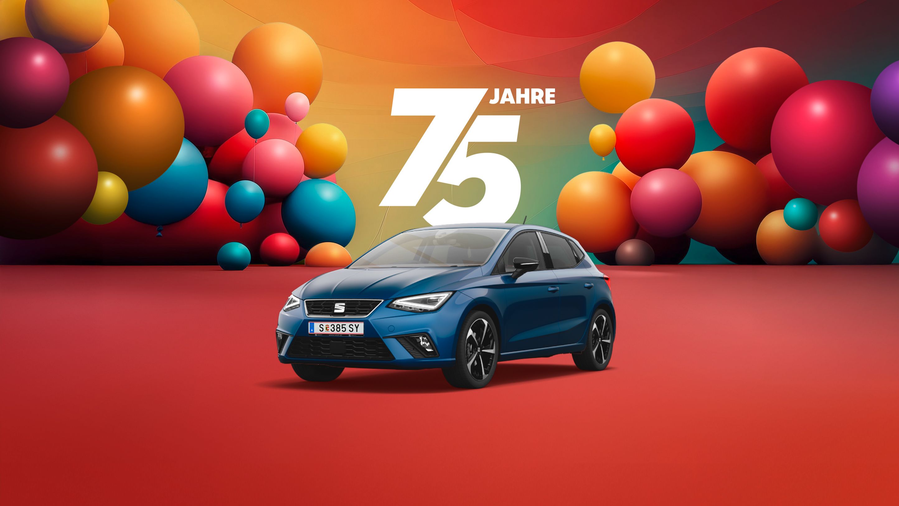 Jubiläumsangebot zum 75-jährigen Bestehen – farbenfrohe Luftballons und eine Darstellung von einem blauen SEAT Ibiza