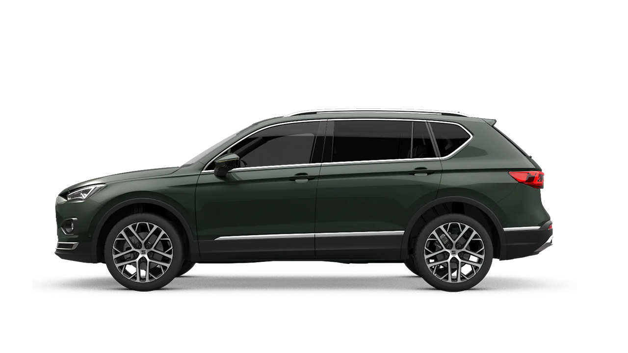 SEAT Tarraco  in dunkelgrün Seitenansicht.