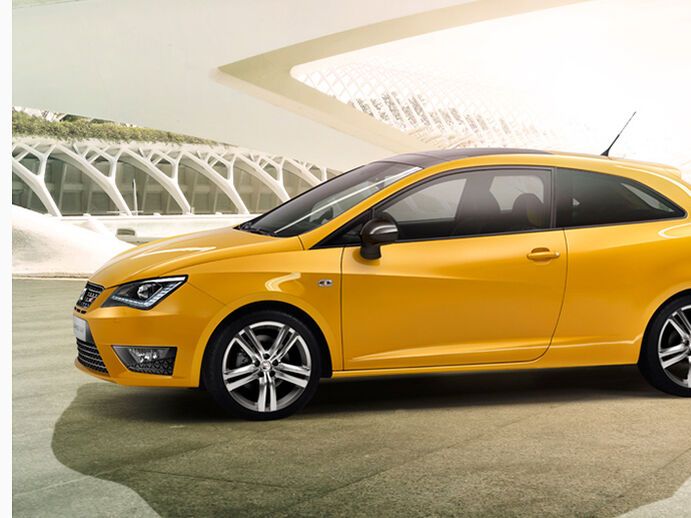 Ein gelber SEAT Ibiza CUPRA von 2013.