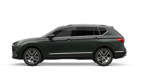 SEAT Tarraco  in dunkelgrün Seitenansicht.